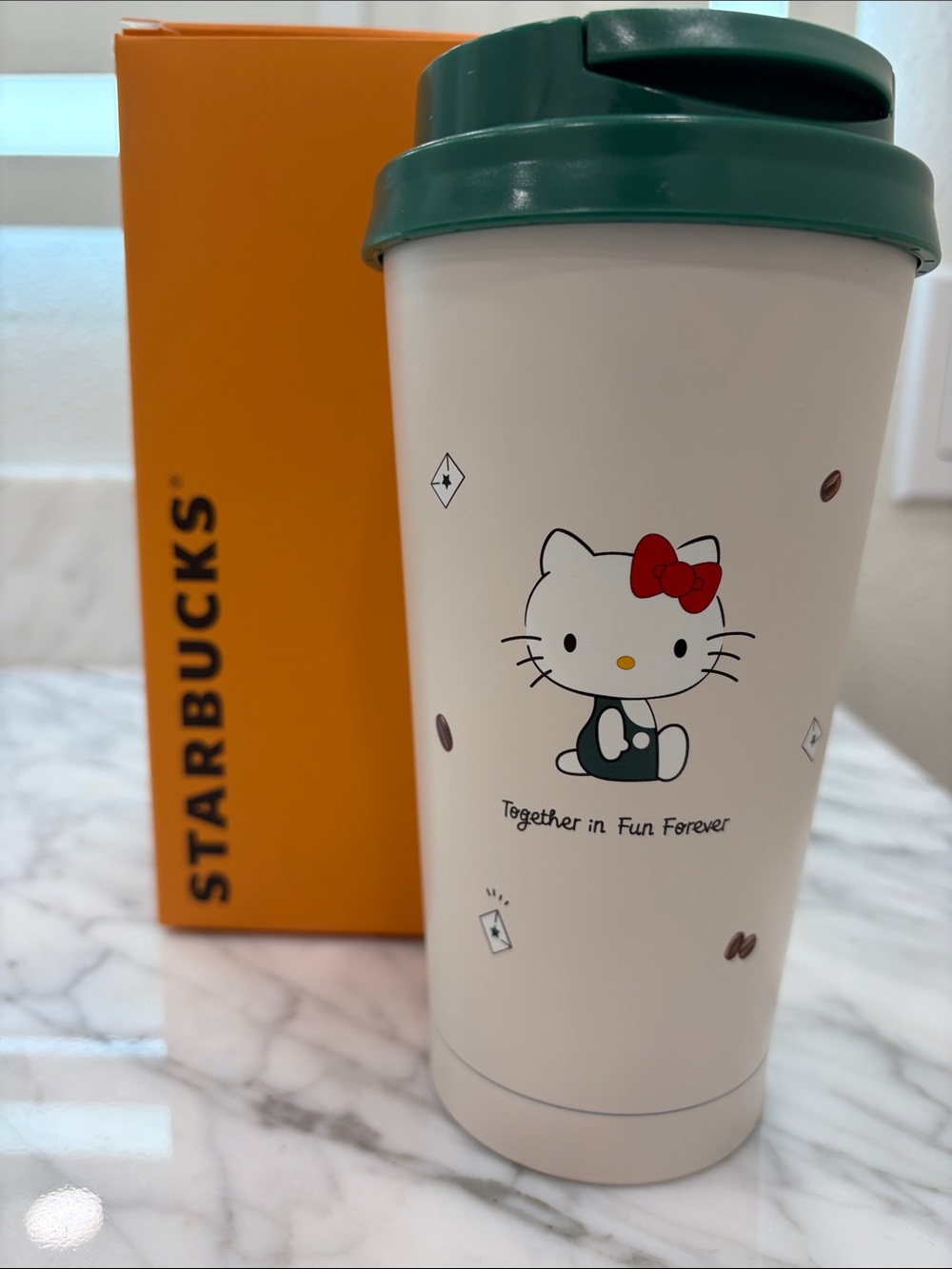 Starbucks cream Tumbler with Green Lid and Hello Kitty collab